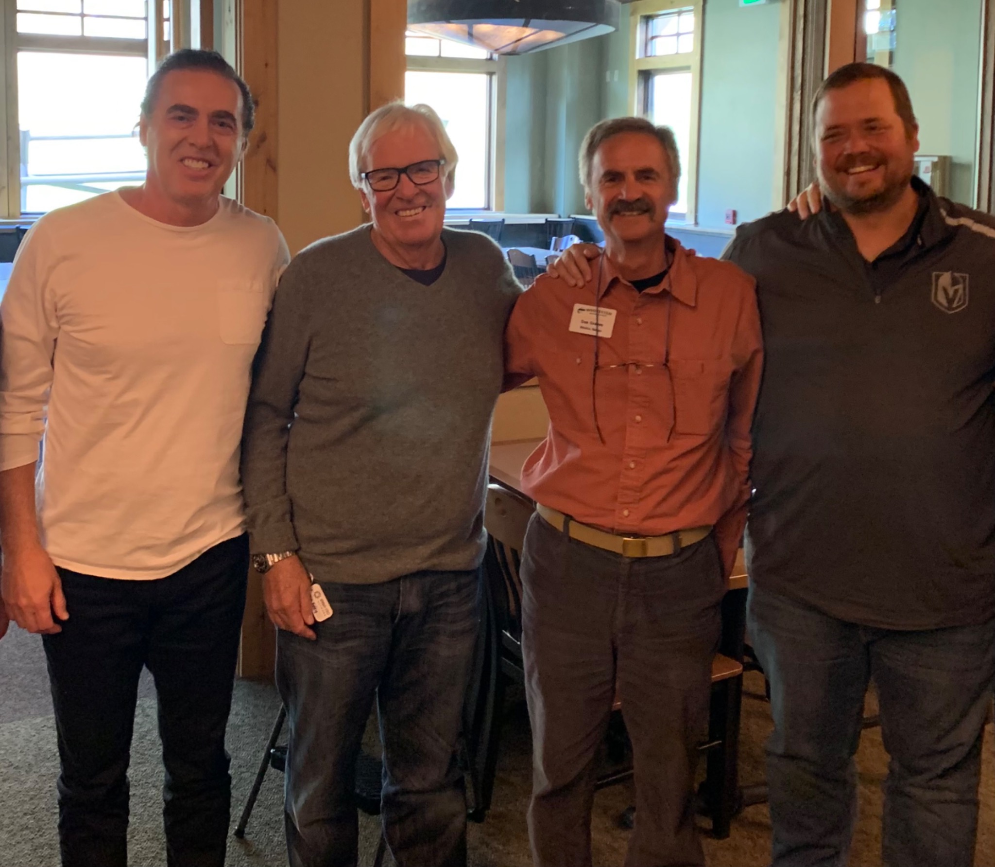 John A. Kuelbs, Bill Foley, Dan Graves and Rob Foley at a Whitefish Mountain Resort board meeting
